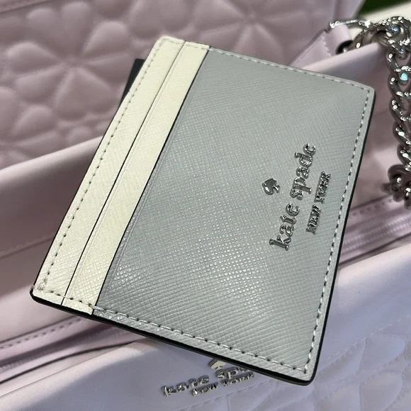 Kate Spade Madison Small Slim Card Holder
Platinum Grey Multi
NWT - Picture 9 of 16